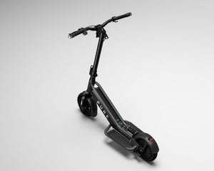 Pure Escape Pro+ Suspension electric scooter – angled studio view