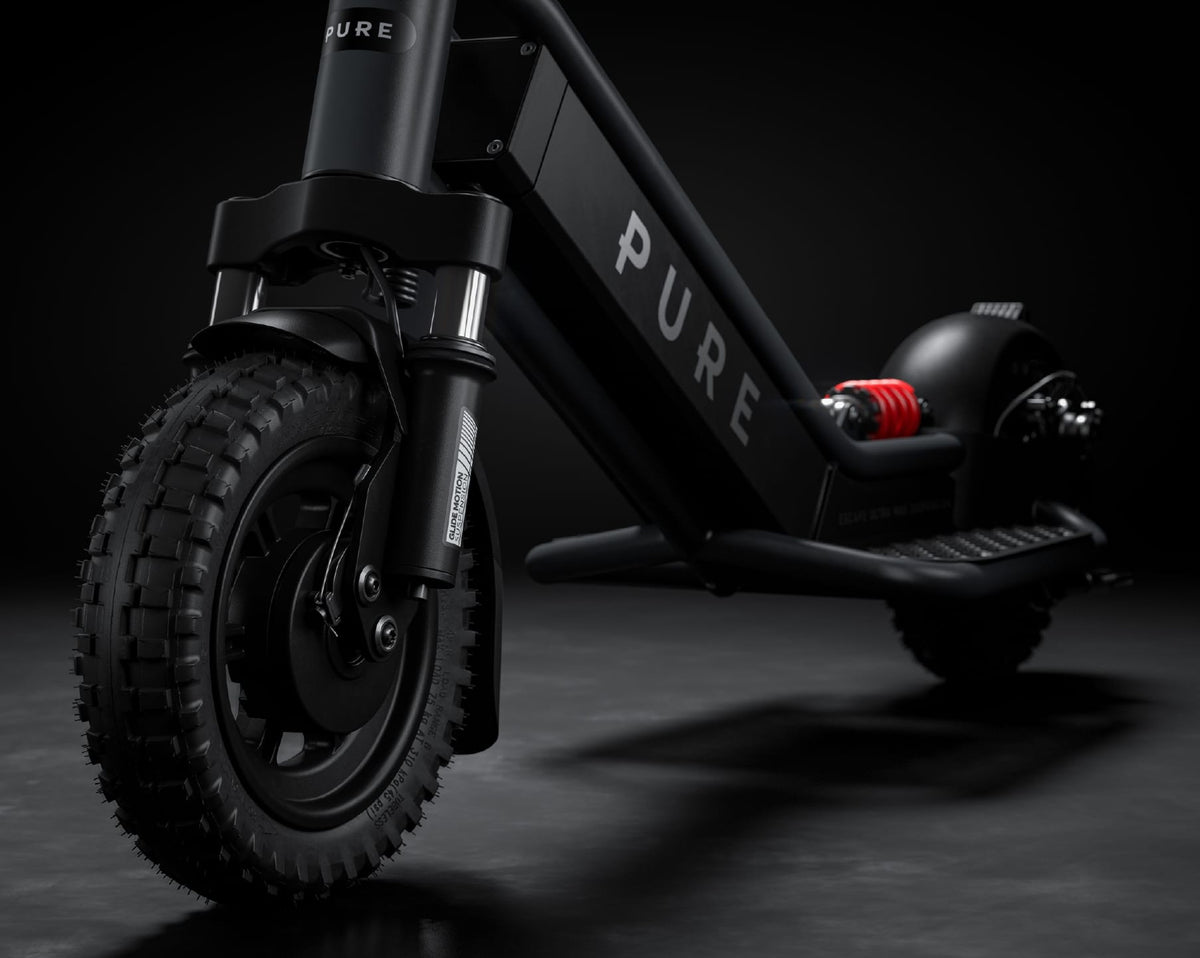 Pure Escape Ultra Max Suspension electric scooter – front wheel and suspension fork close-up