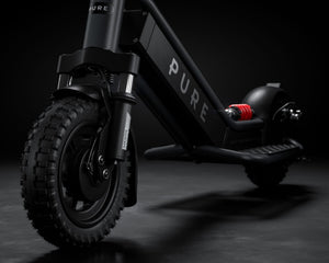 Pure Escape Ultra Max Suspension electric scooter – front wheel and suspension fork close-up