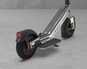 Pure x McLaren Chrome electric scooter – rear wheel and chrome foot platform detail